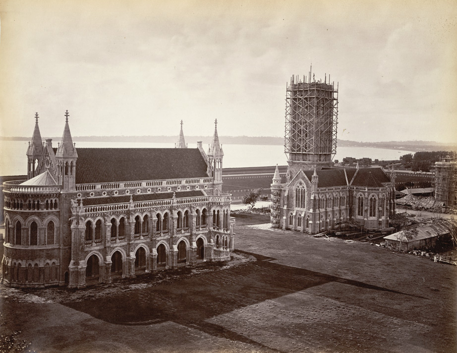 The University of Bombay buildings under construction in the 1870s, the clock tower encased in scaffolding