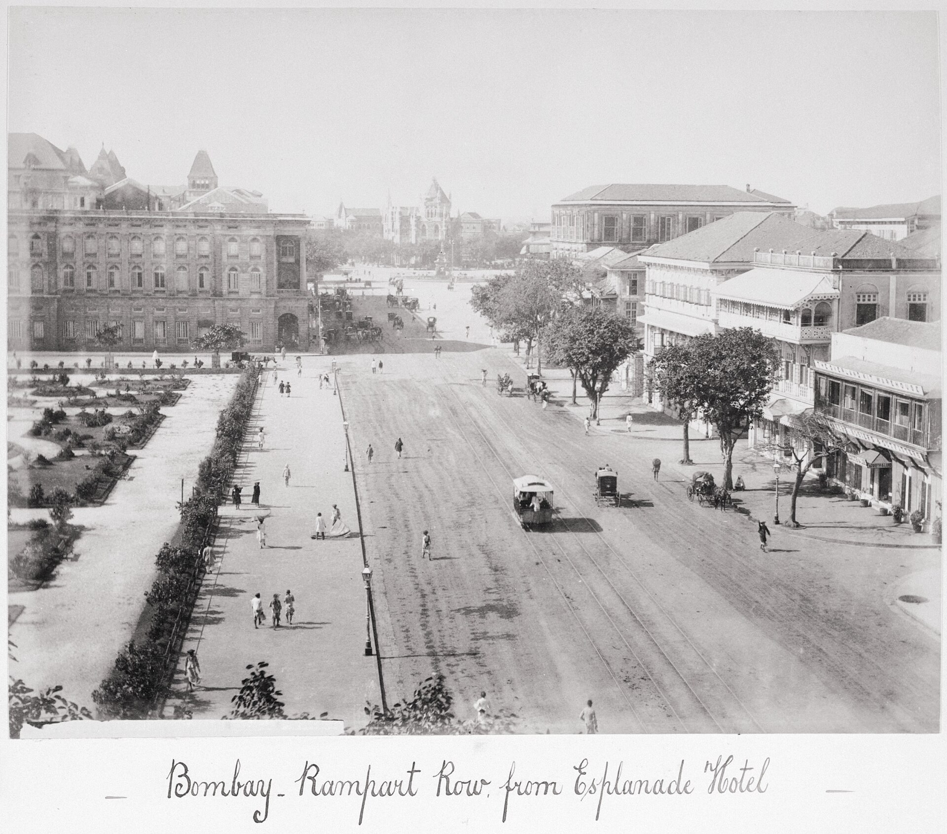 Rampart Row, Bombay, photographed from the Esplanade Hotel — a wide street with a horse-drawn tram